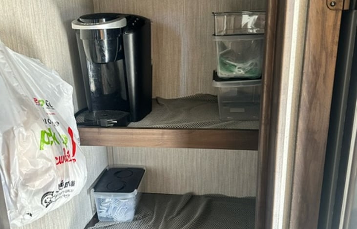 Plenty of pantry space to store food & cooking devices.