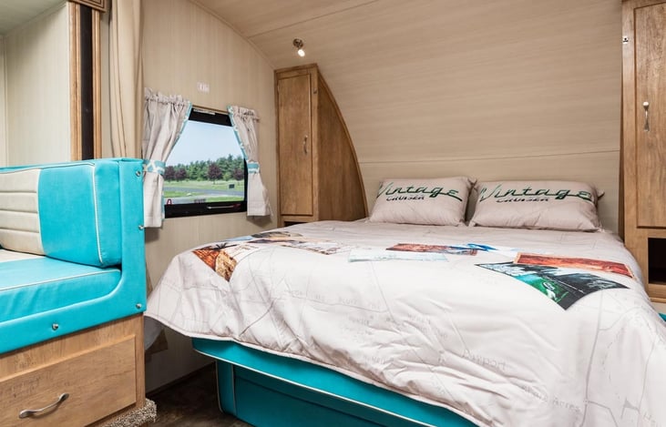 Queen size Murphy bed opened up for bed time.