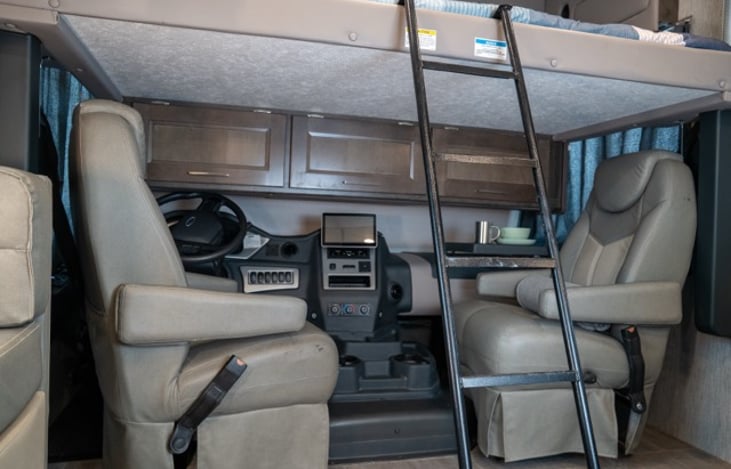 full sized over cab bunk features a ladder for easy in and out