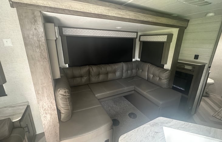 It does have a table I just take it down for transportation because it’s easier to get through without having to put the slide out.