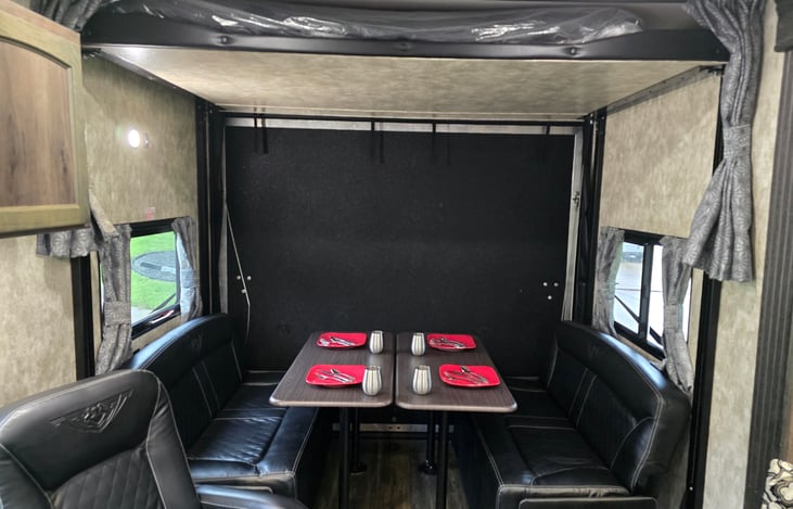 Plenty of booth style seating with tables for any meals indoors.