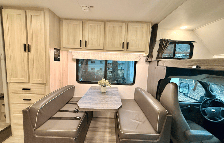 Convertible dinette that turns into a double bed.