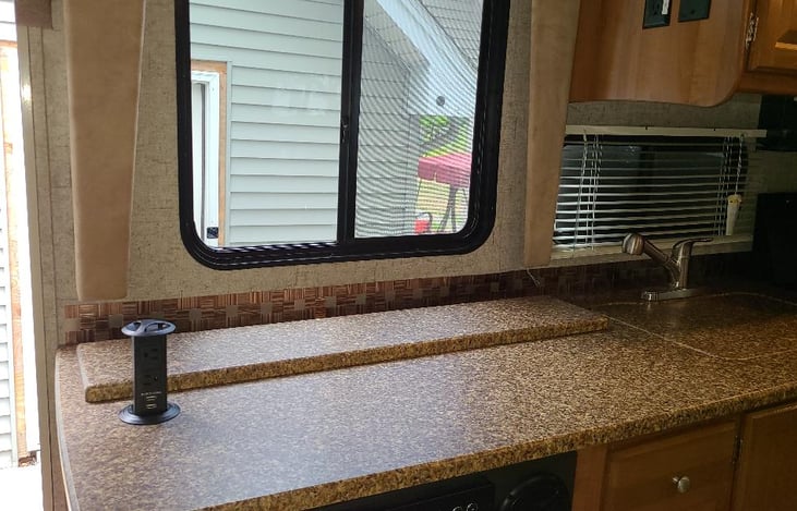 Kitchen Counter Space (w/ Pop-Up Electric & USB Outlets)