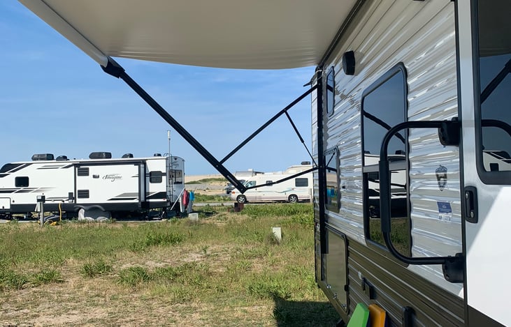 Full size awning and door grab handle.