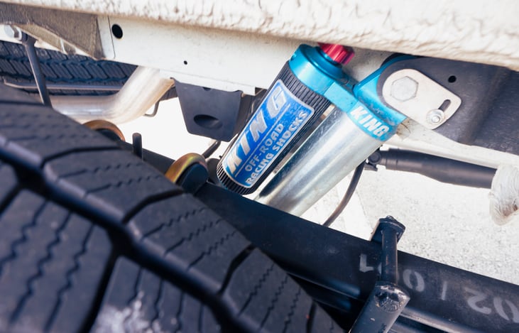 King Offroad rear shocks and VanCompass mini leaf springs