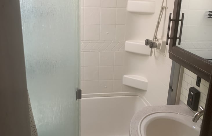 Large walk-in shower with built in seat