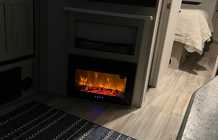 Cozy fire and TV for those rainy days.