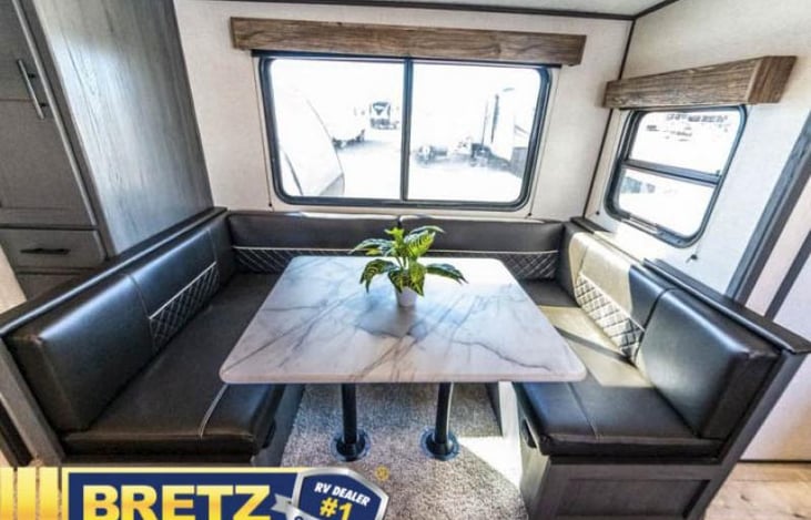 Dinette-storage below seats, converts to a full size bed