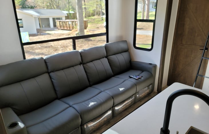 Large comfortable sofa, and I have fallen asleep on this stretched out. I am 6'4"