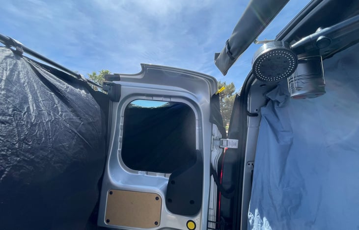 The private shower room using rear double doors and a curtain is easy to setup for the privacy.