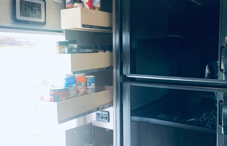 Coffee, creamer, sugar, spices, etc. Large fridge and freezer run continuously.