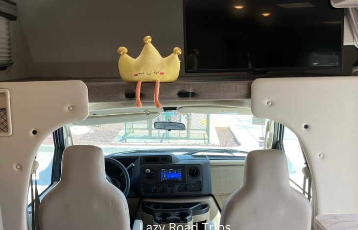 The overhead bunk is great for storage and comes with a protective guard rail to prevent sudden flying objects during a quick stop. The TV swivels out and is connected to the DVD player/DVDs in cab.