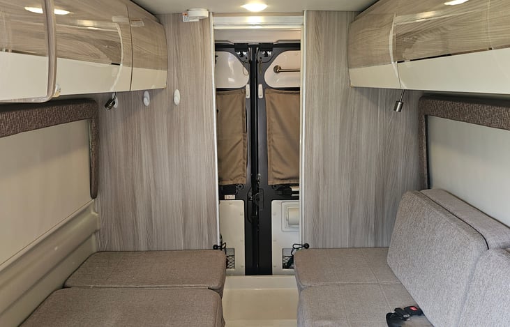 Privacy shades. Pass through access to rear bath.