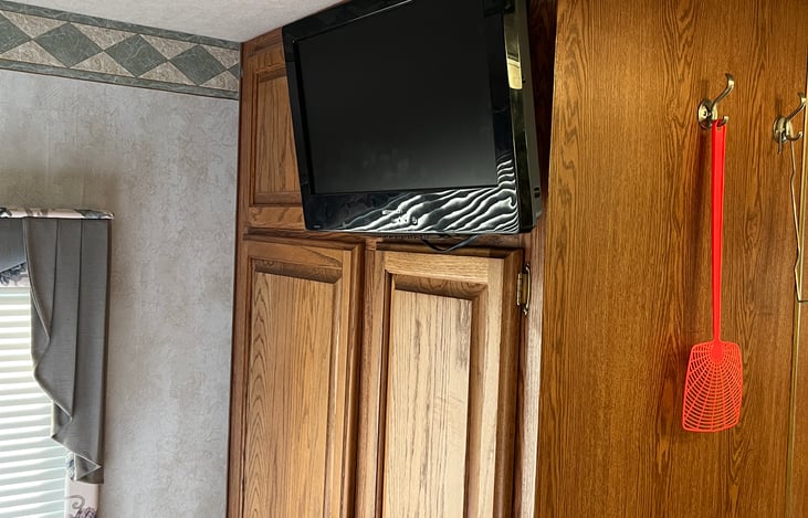 TV and blue Ray/ DVD player in the bedroom