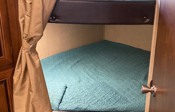 Double bunks with individual lights in each.  Each bunk will sleep 2 people.