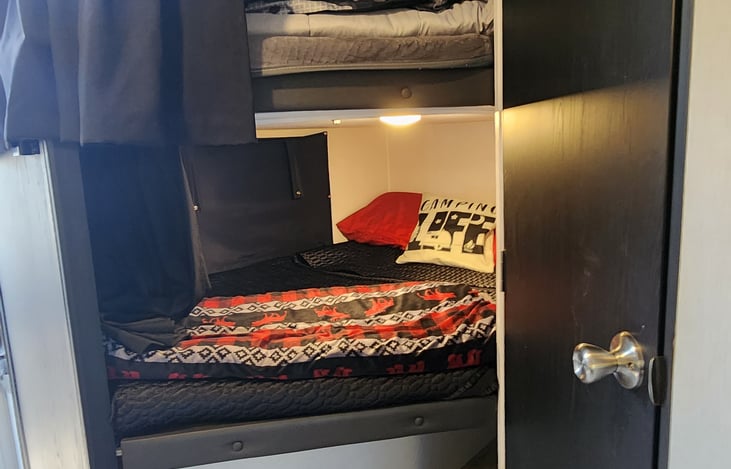 Favorite part two full size bunks bed !! To make kids experience more exciting