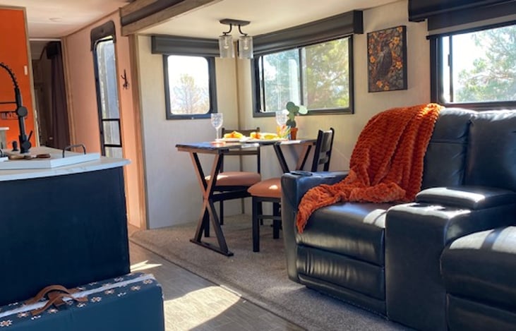 Pendant fixture above dining table.