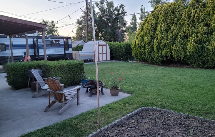 Looking toward RV parking area from far corner of the yard