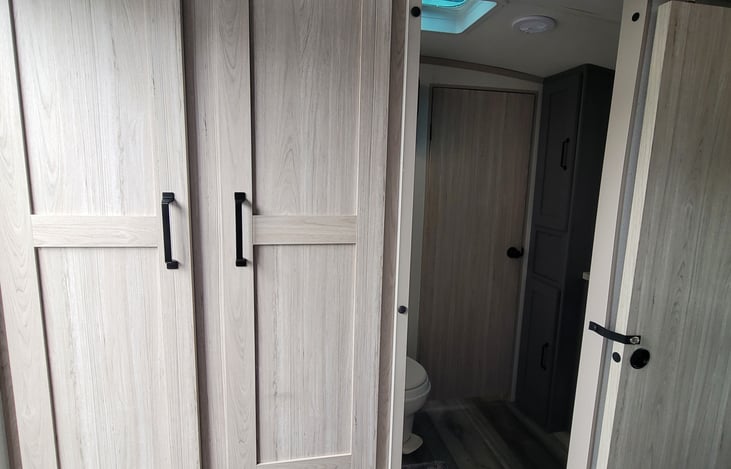 Storage in Master and view Into Main Bath