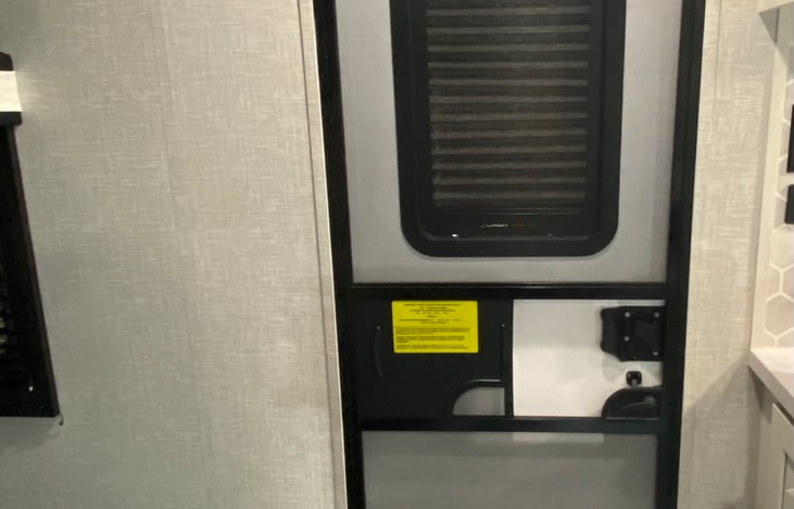 Door includes screen for fresh air and privacy shade