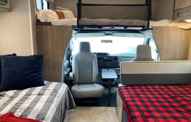 Main living area with beds made.