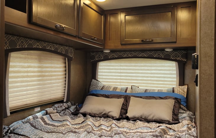 A better view of the main sleeping area with the upgraded bedding.