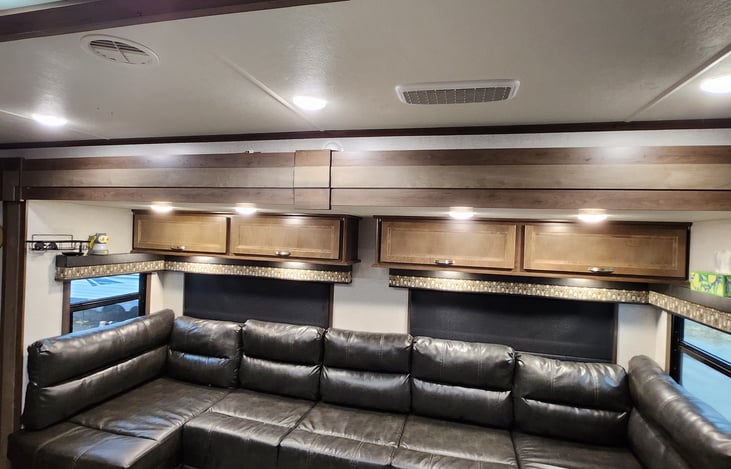 Living room couch, overhead storage