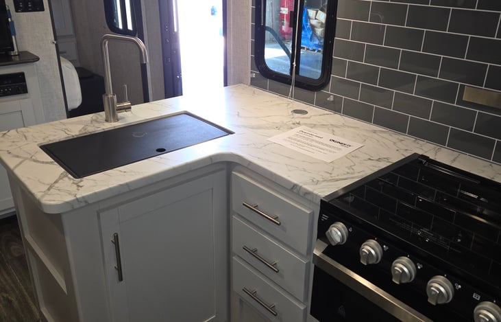 Kitchen, stove, microwave and oven.