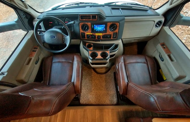 NEW Upgraded Custom Upholstery Makes this EVEN MORE Comfortable & Roomy Drivers area, Along with Bluetooth & Rear Camera Monitor.