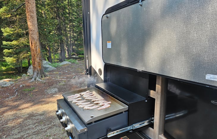 What's better than bacon frying on an outdoor grill in a beautiful campsite?