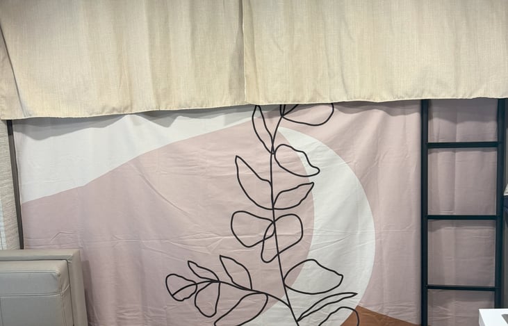 tapestry to tuck under cabover mattress to increase efficiency of AC in coach