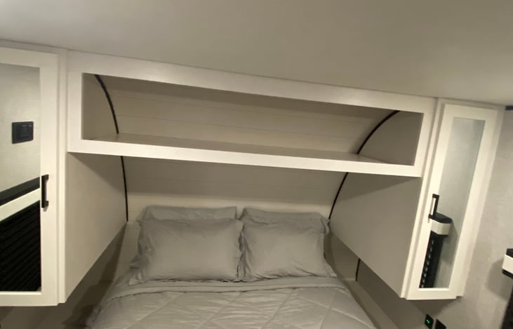 Master bedroom Queen Bed with wardrobe and cabinets as well as storage under the bed for all your family storage needs!