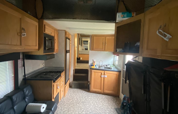 Kitchen and couches.