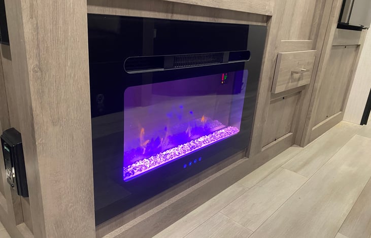 Electric fireplace that puts out heat