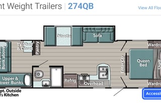 Camper with a queen living space and a bunkhouse.