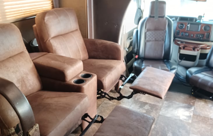 Captains chairs facing TV