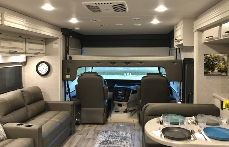 Note the space above the driver's area; This is a king size bed that is raised up while driving, and lowers down when parked for the night, with a push of a button.