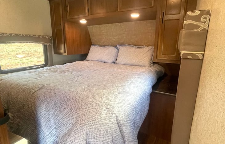 Master Bed with residential size queen bed.