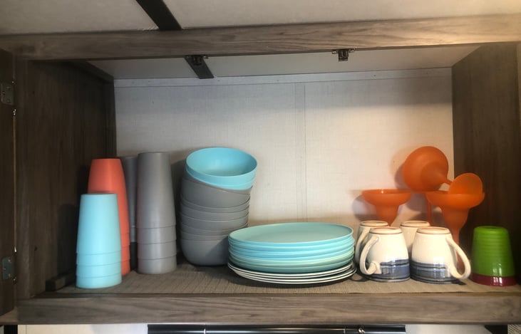 Cups, bowls, plates, coffee cups come with rental.