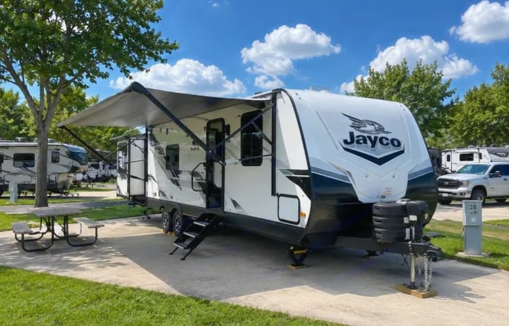 Enjoy an easy Smoky Mountain getaway in our "Feathered Nest". This family-friendly travel trailer has a bunkhouse layout, a private queen bed, convertible living space, a full kitchen, and much more!