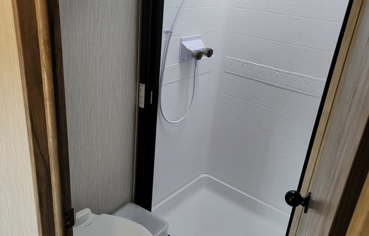 Walk-in shower with skylight