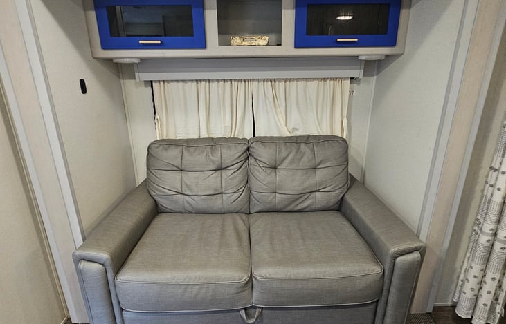 The loveseat extends into a comfy chaise-style lounge