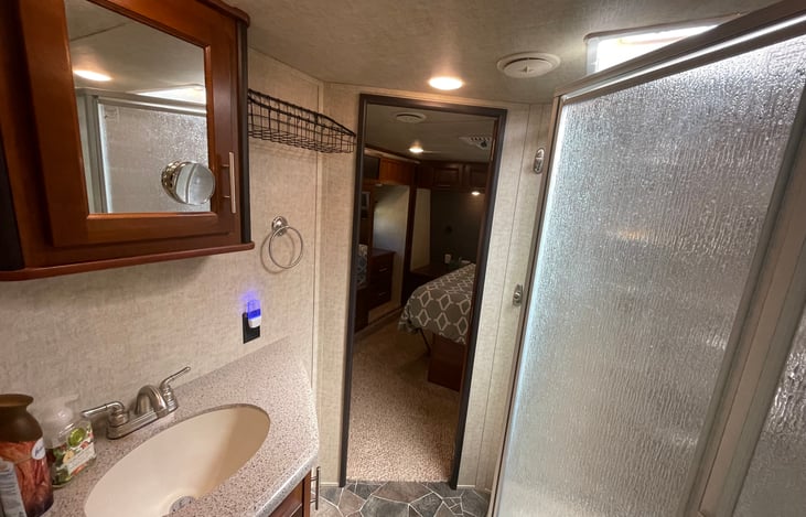 Bathroom, w/door to bedroom.