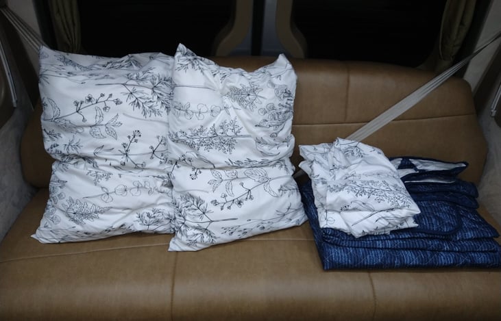 Pillows ,Sheets, and Blanket are provided at no additional cost.