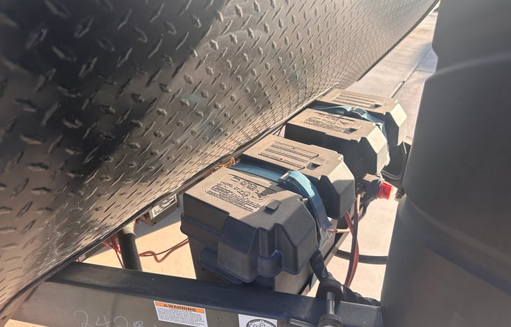 2 marine deep cycle batteries with kill switch.