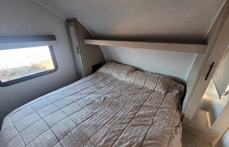 Queen bed located in private room