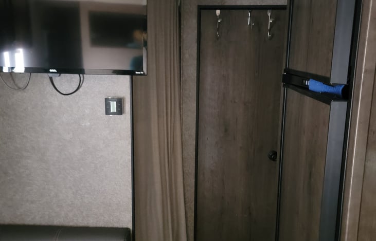 Large-Fridge/Freezer Combo / TV / Bathroom door / Bunk Curtain