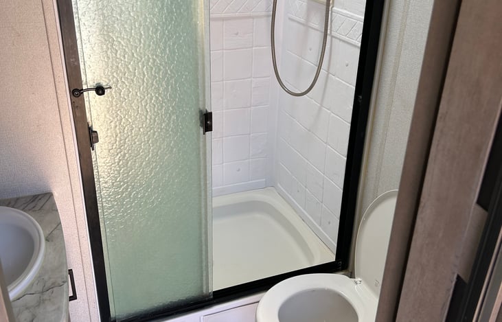 Spacious galley and fully-equipped kitchen. Plenty of room for everyone. Private bunkhouse and private bedroom on opposite ends. Pop-up TV to keep everyone entertained. Ample storage.