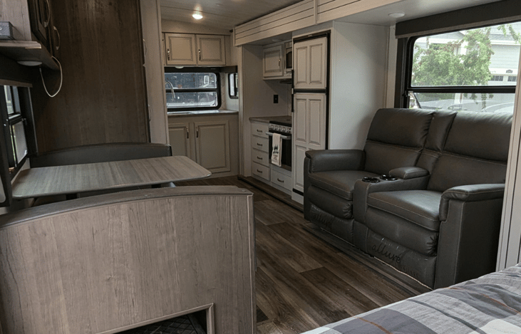 Spacious living area. Privacy curtain to section off the King bed