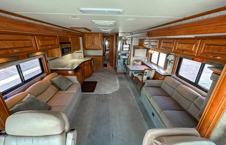 Huge Spacious Living Room and Kitchen with both slides out provides ample room for gatherings, easily seating 8 or more. Ample storage so you can settle in.